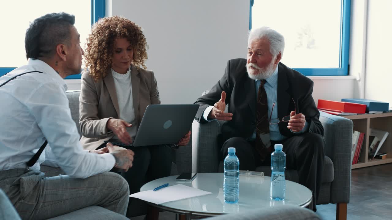 Two businessman shaking hands after signing the contract