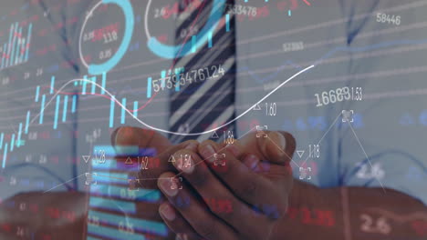 animation of graphs, trading board, midsection of african american businessman asking for support