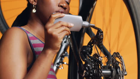 serviceman using specialized glue to mend defective bicycle chain