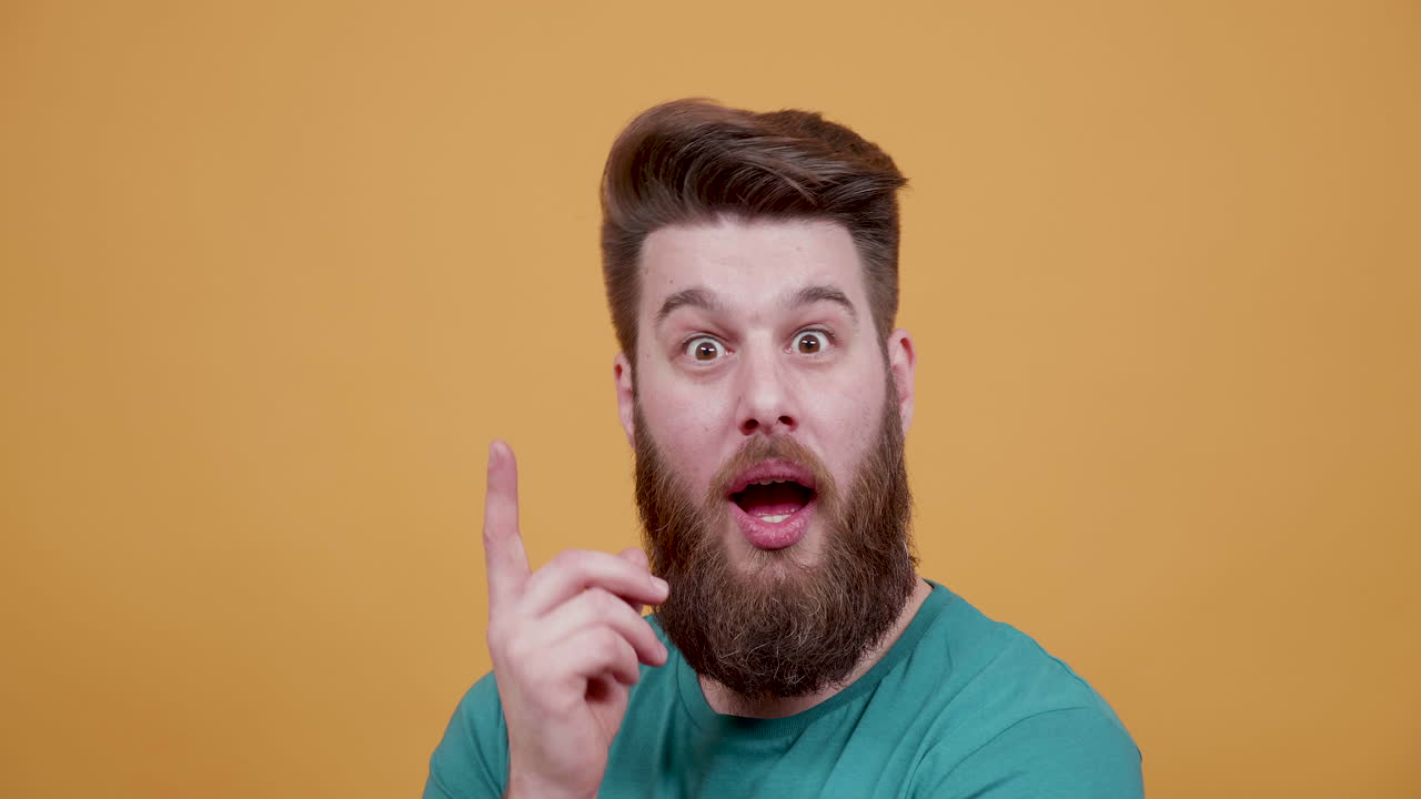 Man with beard thinking