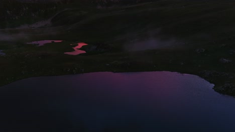 radiant reflections, captivating high-res footage of the pink sunset sky mirrored on water