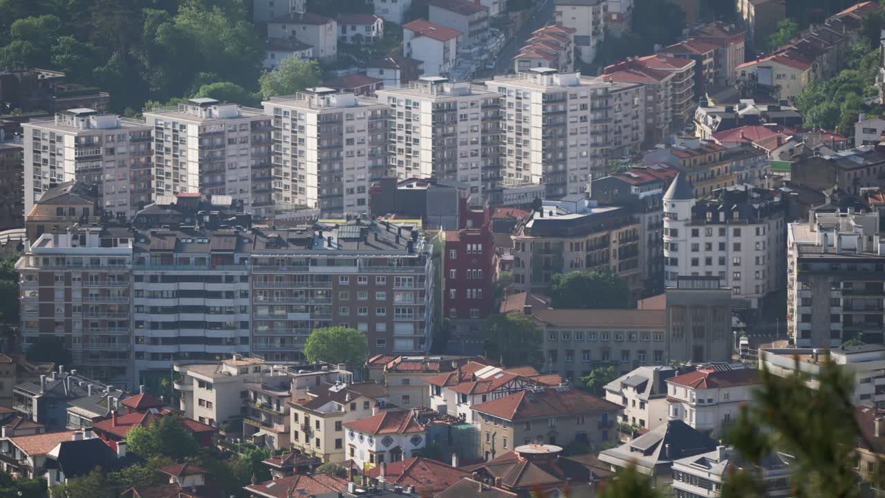 Soft pan over dense residential area of city in Spain