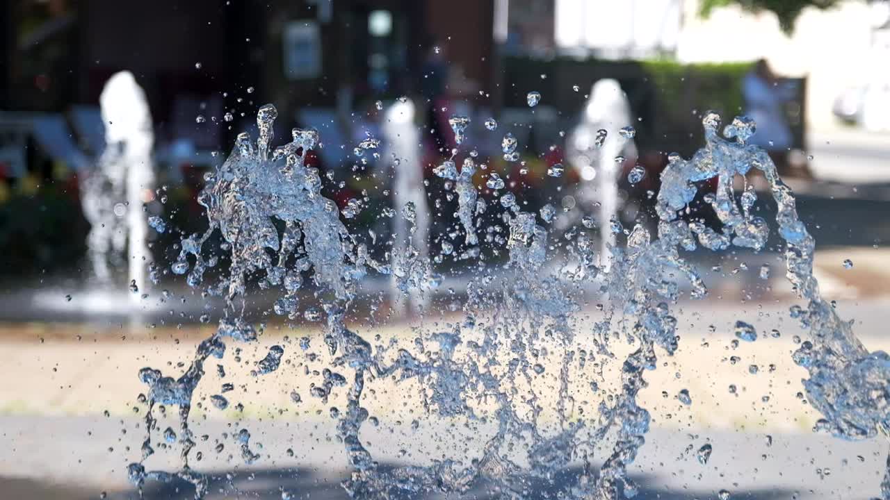 Water splashes from fountain in slow motion