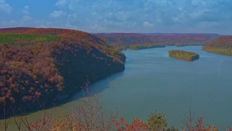 a view of autumn landscape looking over a river