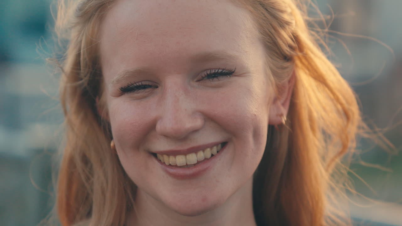 Close-up portraits of a smiling woman