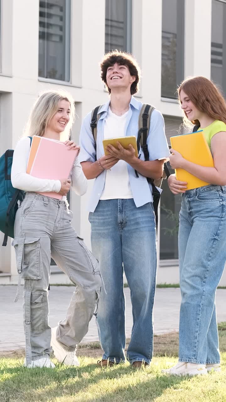 Students chatting and laughing on campus