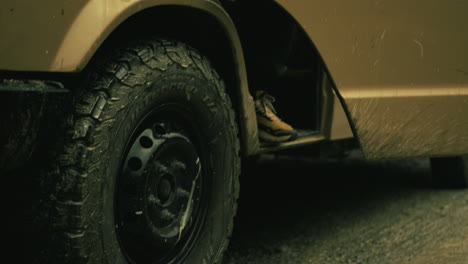 man opening van door in forest
