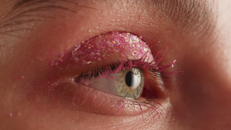 close-up of eye makeup with pink glitter