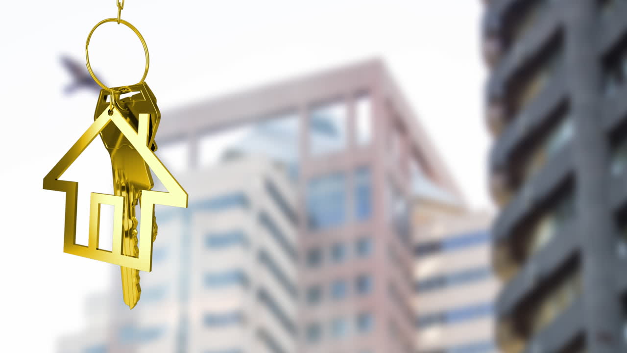 animazione delle chiavi d'oro della casa contro la vista sfocata degli edifici alti
