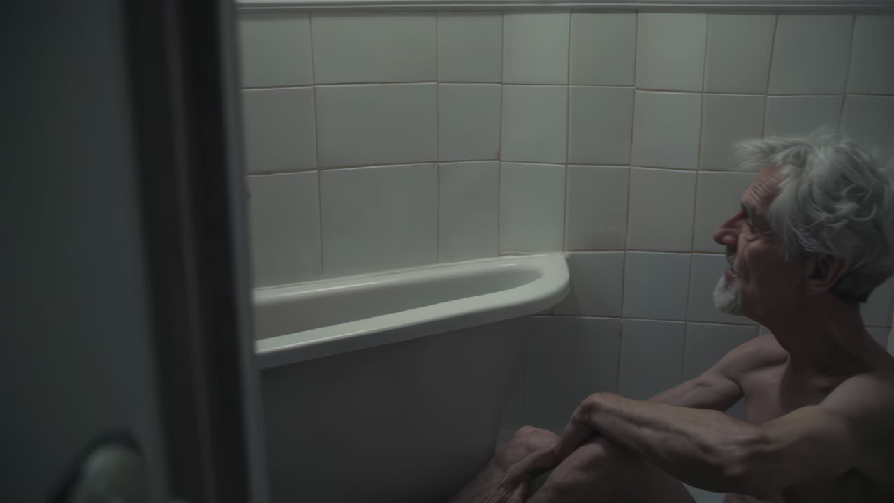 Elderly Man in a Bathroom