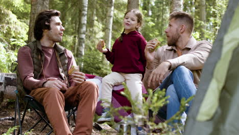 Family-having-picnic-at-the-forest