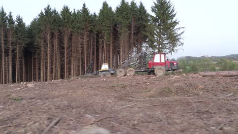 heavy machines in deforestation - drone truck shot