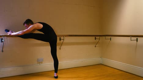 male dancer practicing a ballet dance