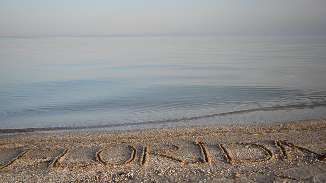 Florida the inscription on the sand. Inscription on sand, the beach