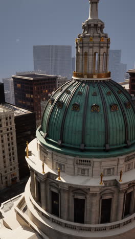 close-up view of a large dome on top of a building in a city