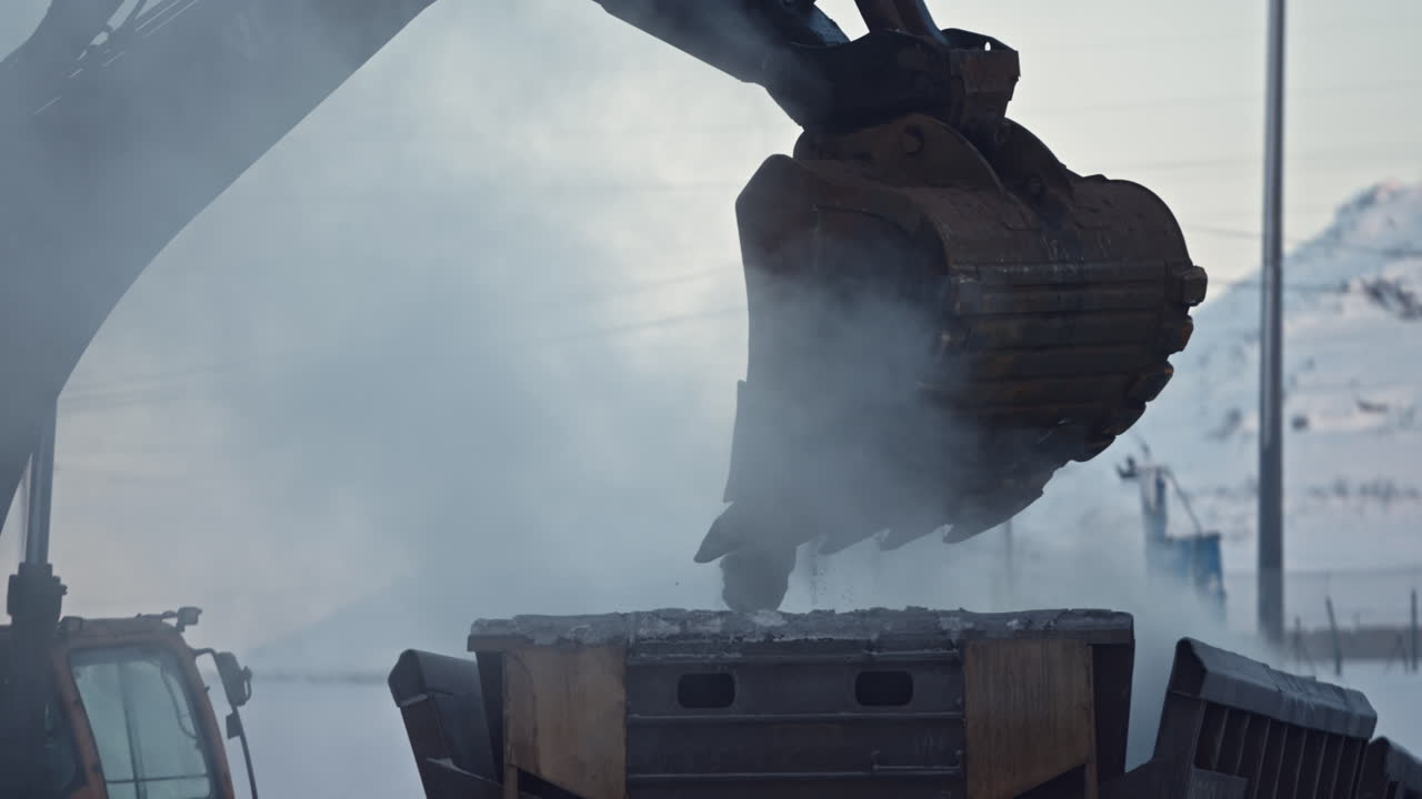 겨울철에 무거운 기계 장비를 탑재하고 해체하는 작업