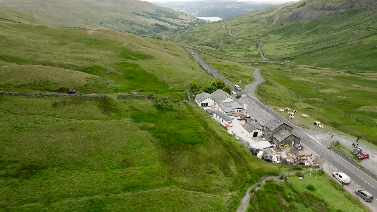 Kirkstone Pass Inn Redevelopment With Orbit View Revealing Lake Windermere In Distance. Summer. Kirkstone Pass, Lake District, Cumbria, UK