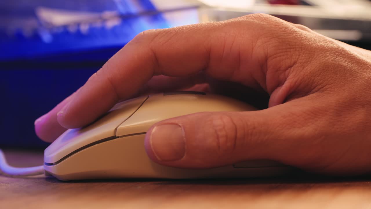 Man working and gaming on retro computer PC, IT engineer with vintage computer at home, using old fashion technology, close up of retro setup.
