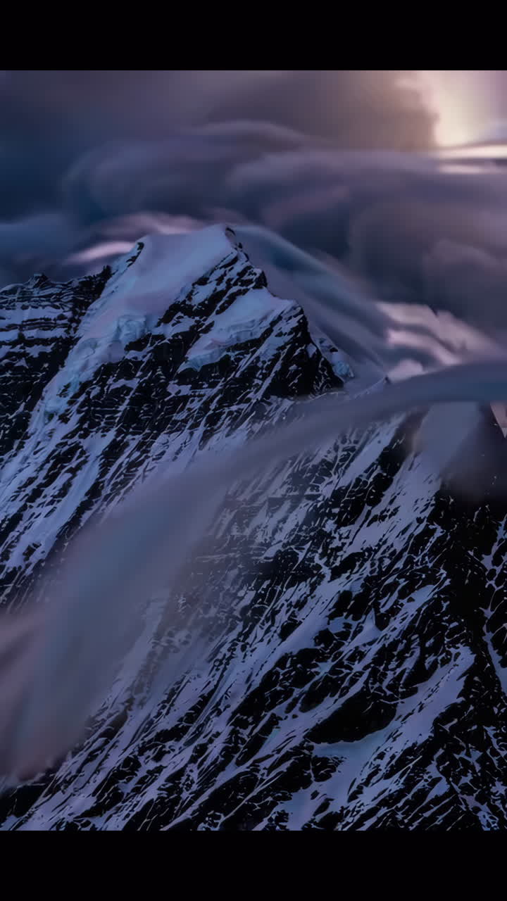 Mountain Peaks in a Stormy Sky