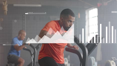 animation of diagrams over diverse sportsmen exercising on elliptical bikes at gym