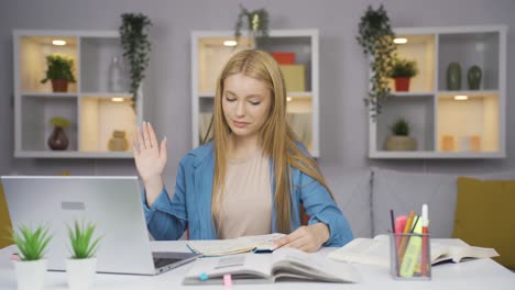 female student video calling about lessons.