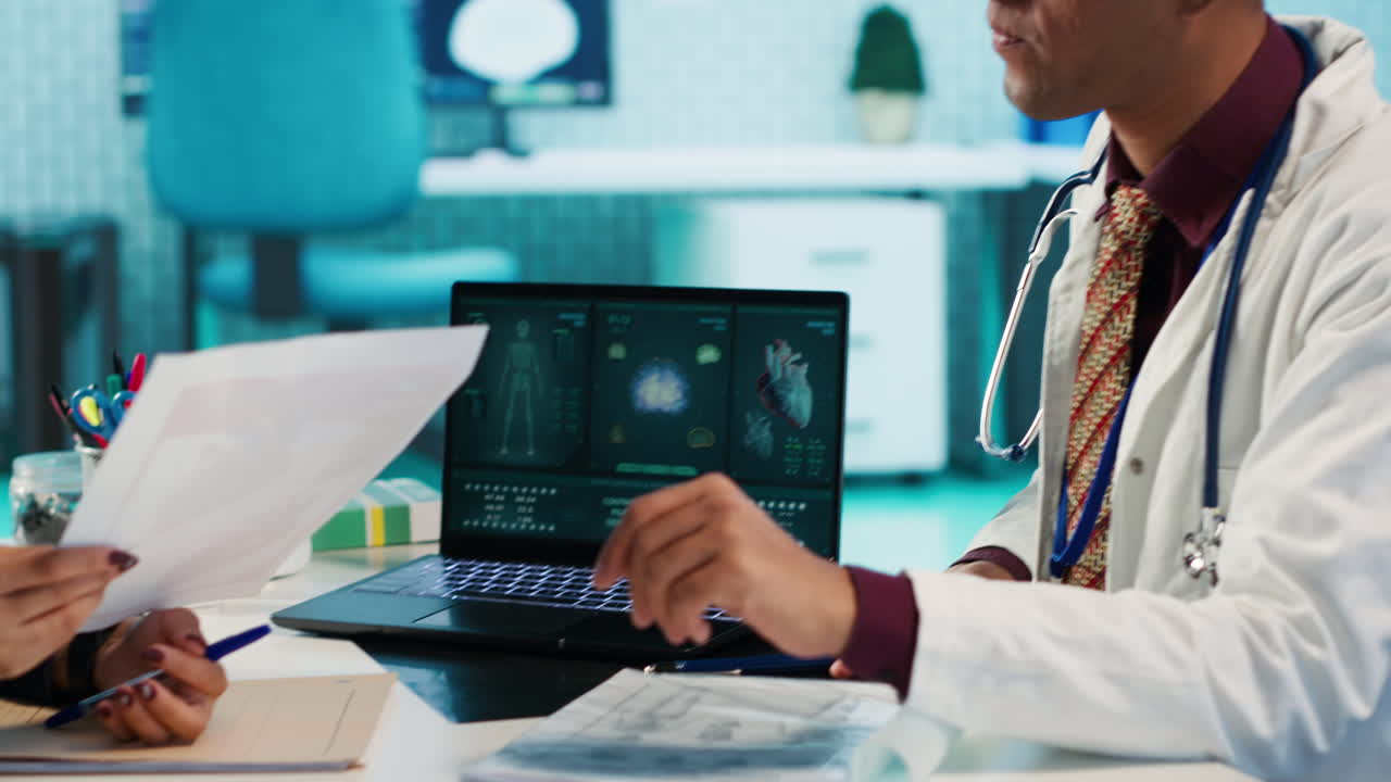 Doctor Analyzing Medical Data on Laptop