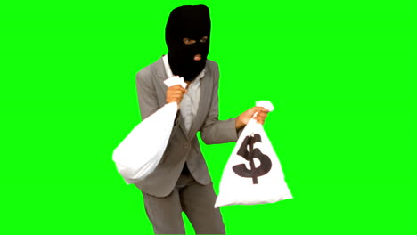 burglar holding money bags on green screen