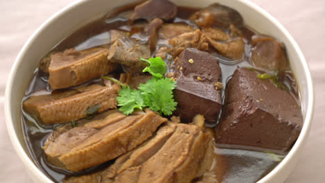 pot-stewed ducks or steamed duck with soy sauce and spices - asian food style