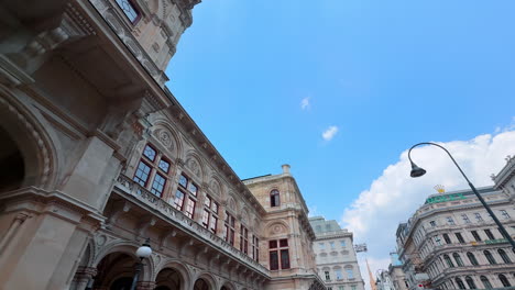 vienna, austria - june 9, 2025: tourists in sunny vienna. visitors stroll through beautiful streets of wien, admiring historic architecture under a clear blue sky