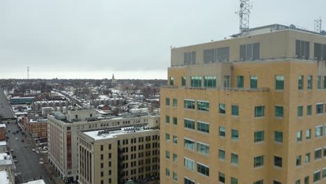 ascending aerial view of davenport, iowa on cold winter day