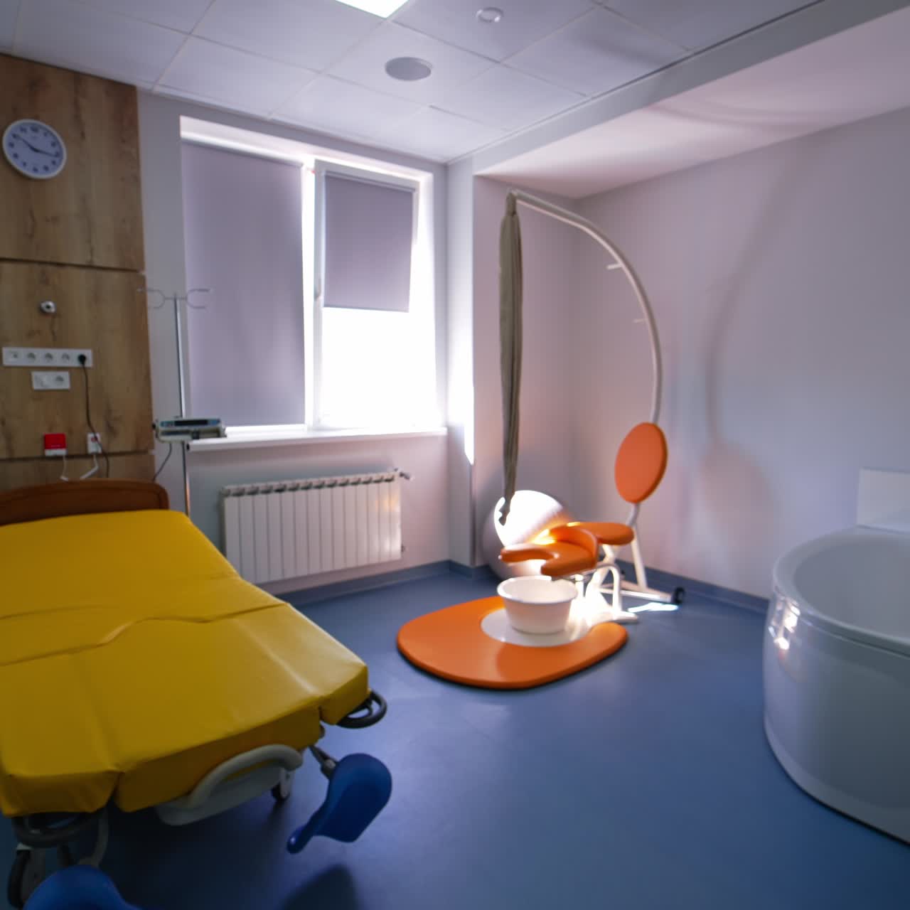 Ward in maternity care unit with special furniture necessary for comfortable labors. Up-to-date room of lying-in hospital