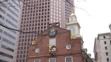 stabilized wide shot of the boston old state house against modern buildings