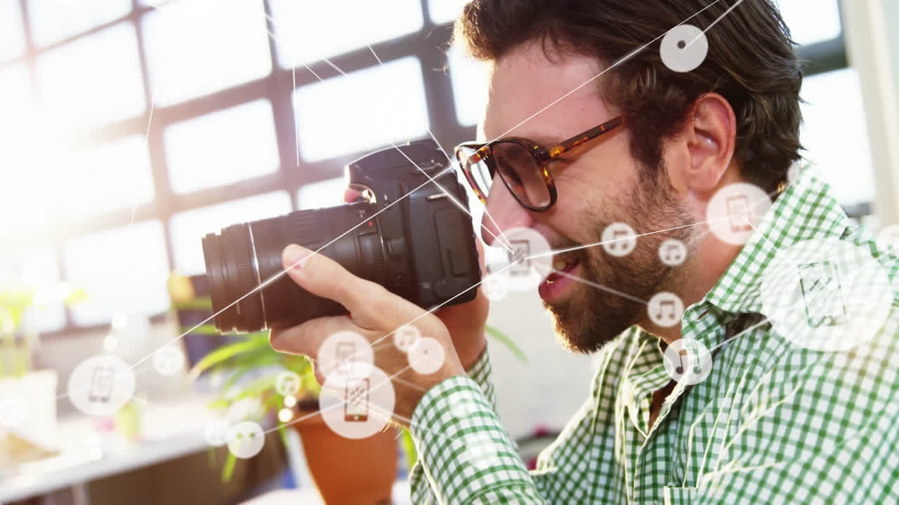 Holding camera, man surrounded by music notes and network animation