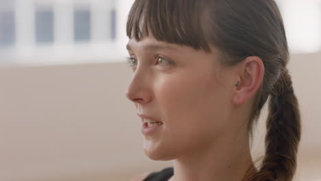 close up portrait beautiful caucasian woman smiling enjoying yoga class practicing healthy lifestyle in fitness studio