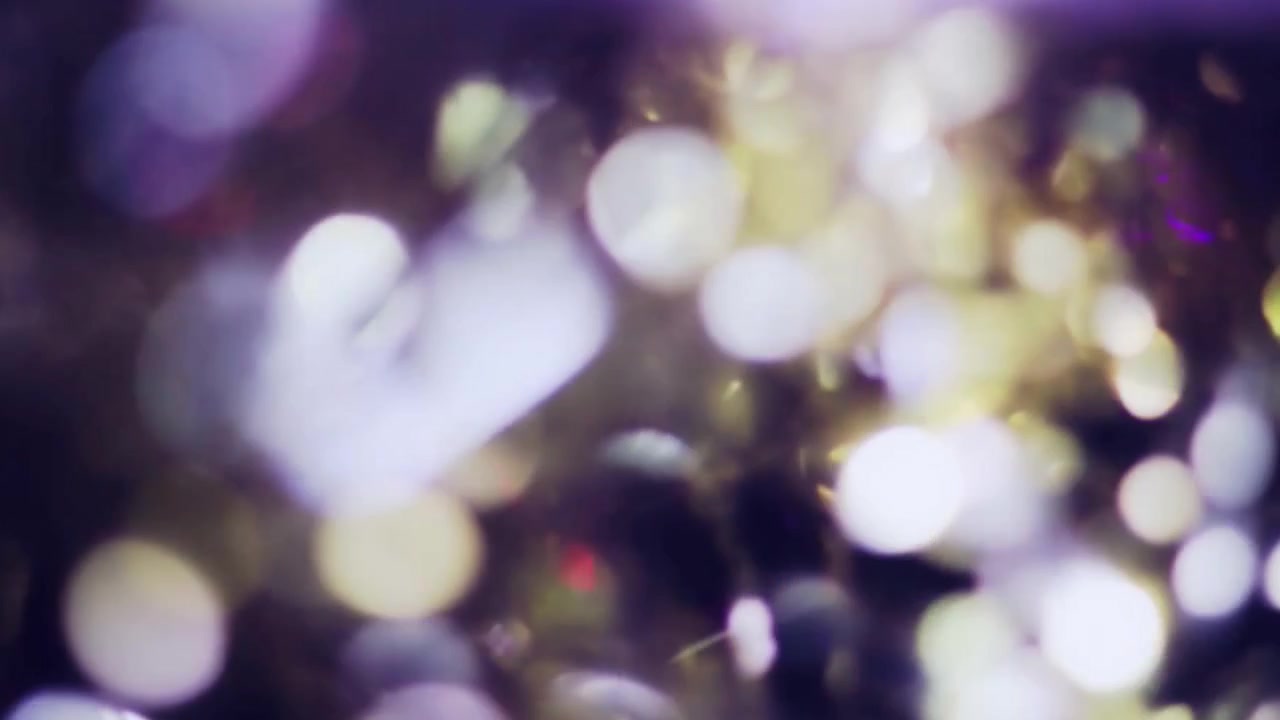 Sfondo astratto con particelle bokeh di luce scintillante