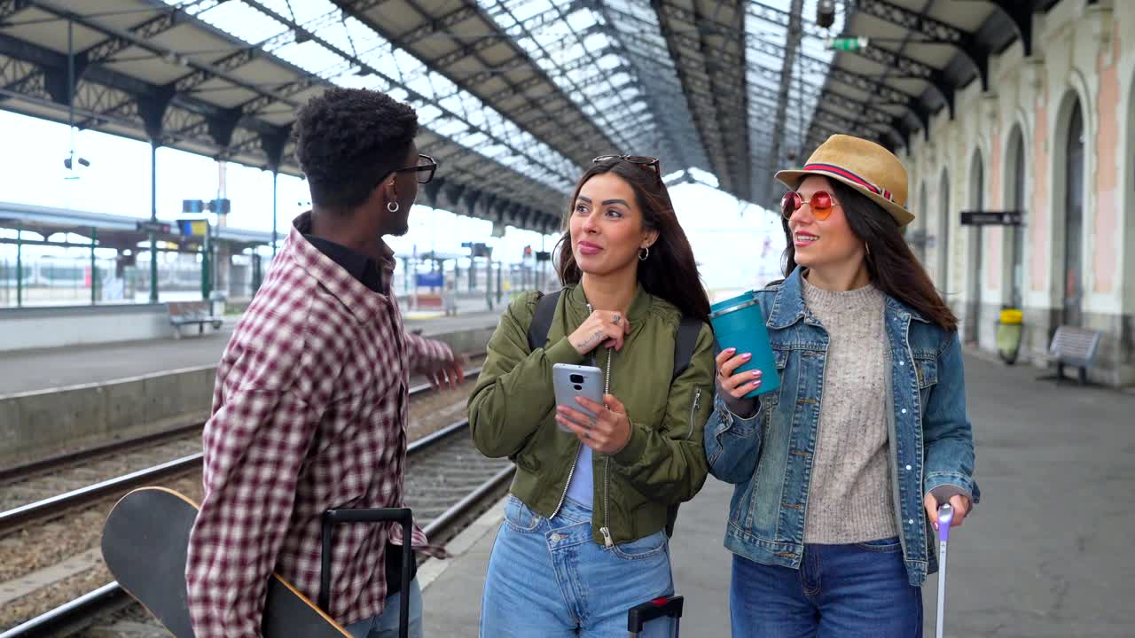 Group of friends at a train station