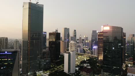 aerial view of jakarta city with quiet traffic