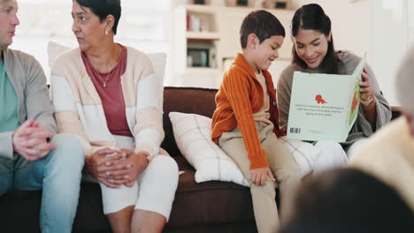 family, children and a mom reading to her son