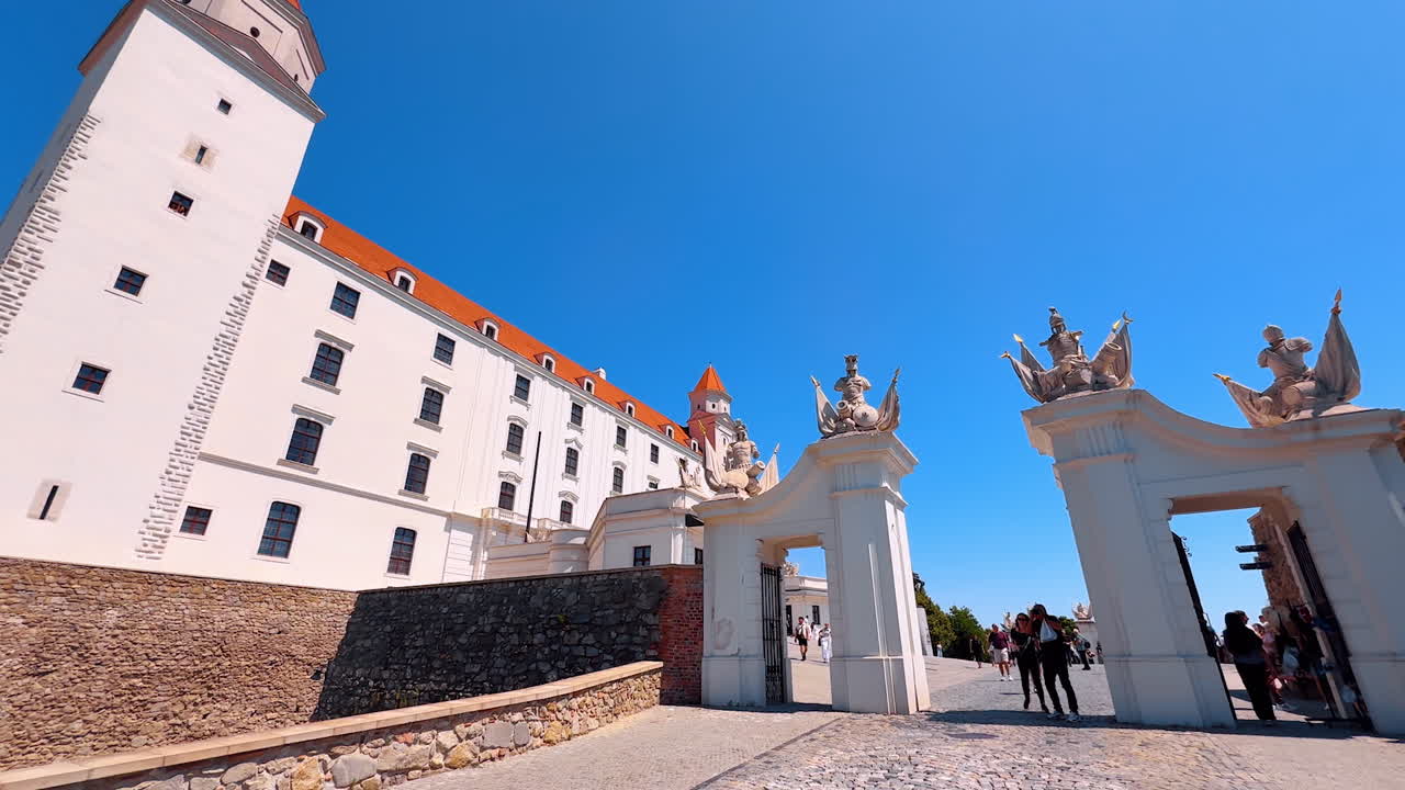 Bratislava, Slovakia, 2 June 2025: Approaching the entrance to the famous landmark of Slovakia. Low angle view at the Bratislava Castle on sunny day