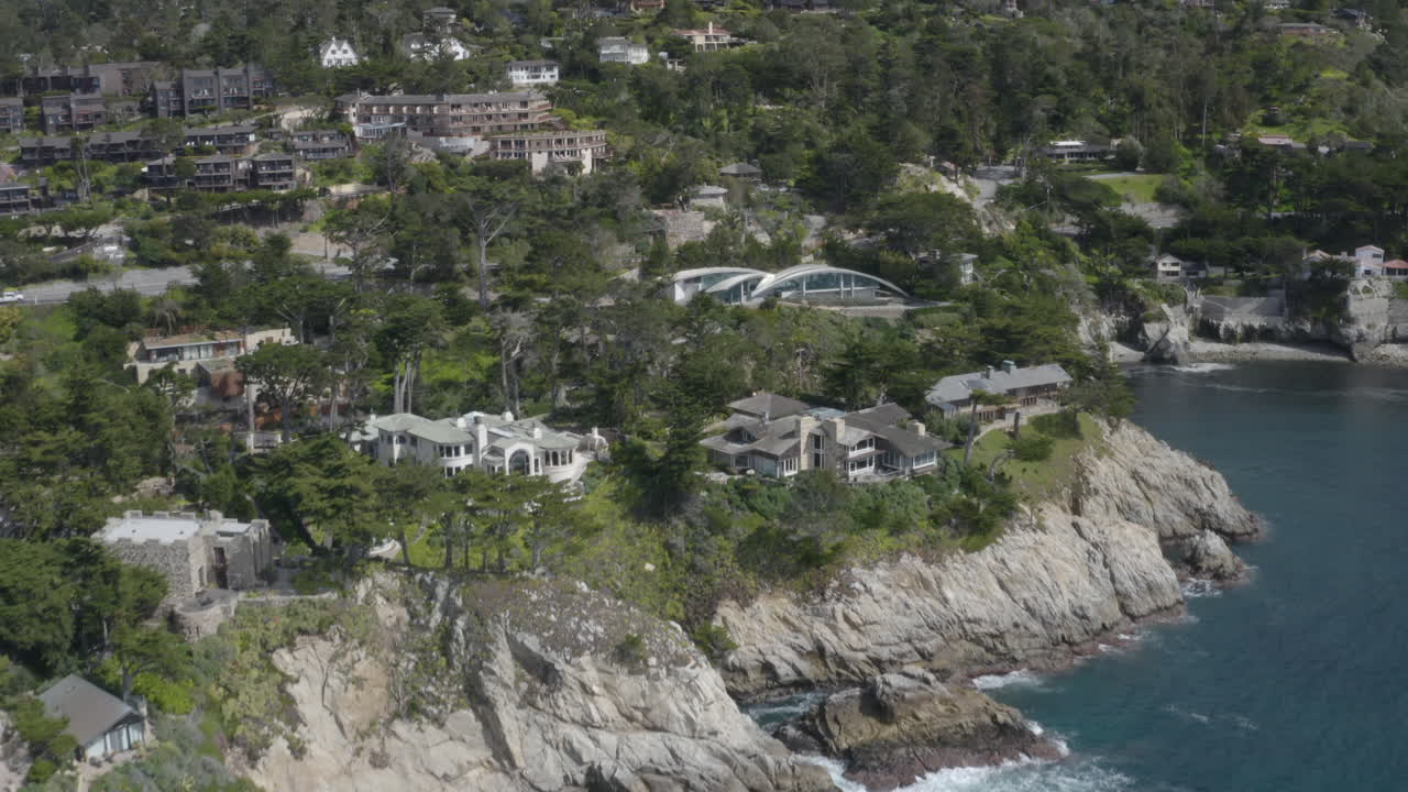 Aerial View of Luxury Homes on a Coastal Cliff