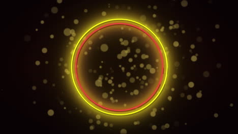 animación de anillos de neón rojos y amarillos sobre manchas de luz sobre fondo negro.