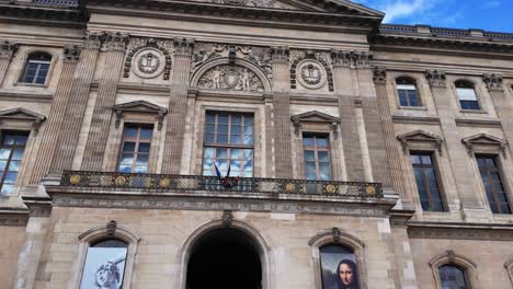 louvre museum paris france building facade poster of mona lisa painting