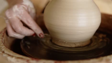 Front-View-Of-Female-Hands-Work-With-Clay-On-A-Potter's-Wheel