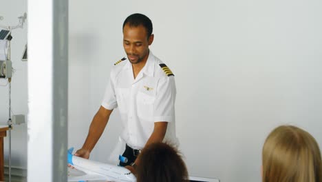 pilot giving training about model aeroplane to kids 4k