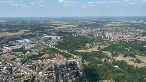 Aerial-view-from-a-jet-cockpit-of-the-western-part-of-Brussels-city,-Belgium,-taken-at-300m-high-during-the-approach,-with-the-Atomiun-in-the-scene