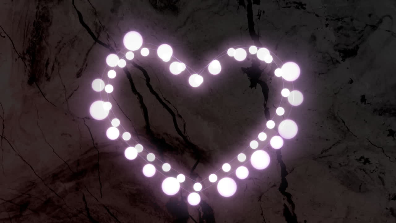 анимация формы сердца светящихся белых сфер, пульсирующих на темном фоне