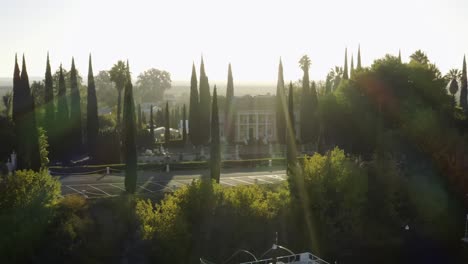 Aerial-of-elegant-Grand-Island-Mansion-wedding-venue-with-morning-sun-rays