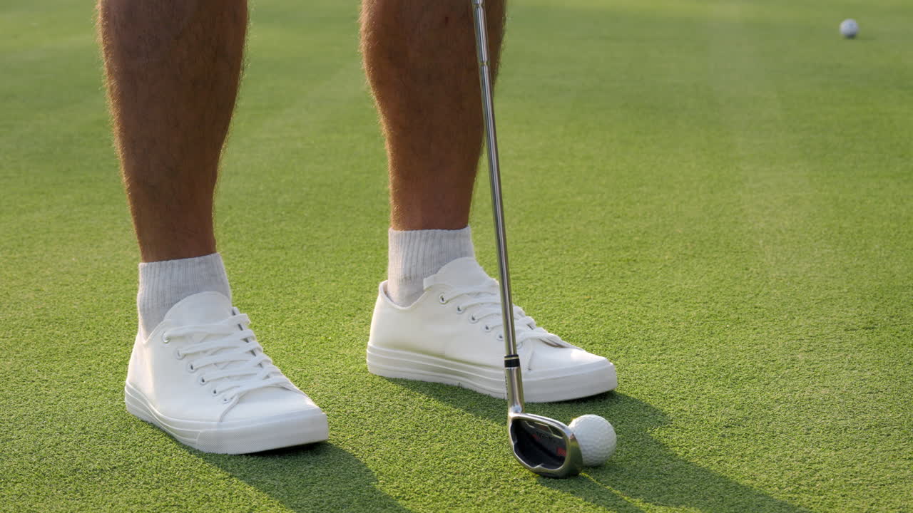Person golfing on a golf course