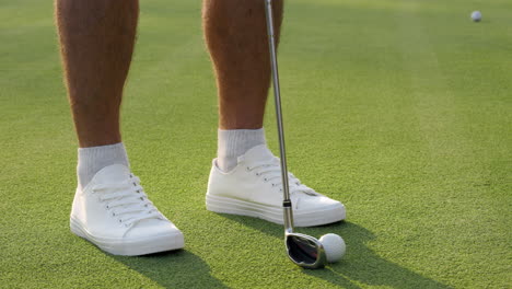 person golfing on a golf course