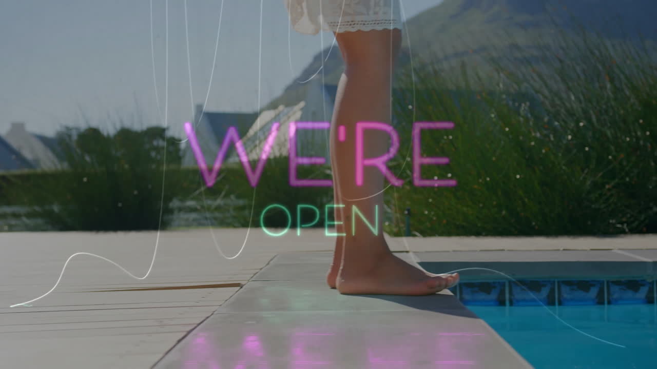 Animation of feet stepping near pool with colorful WE'RE OPEN text overlay